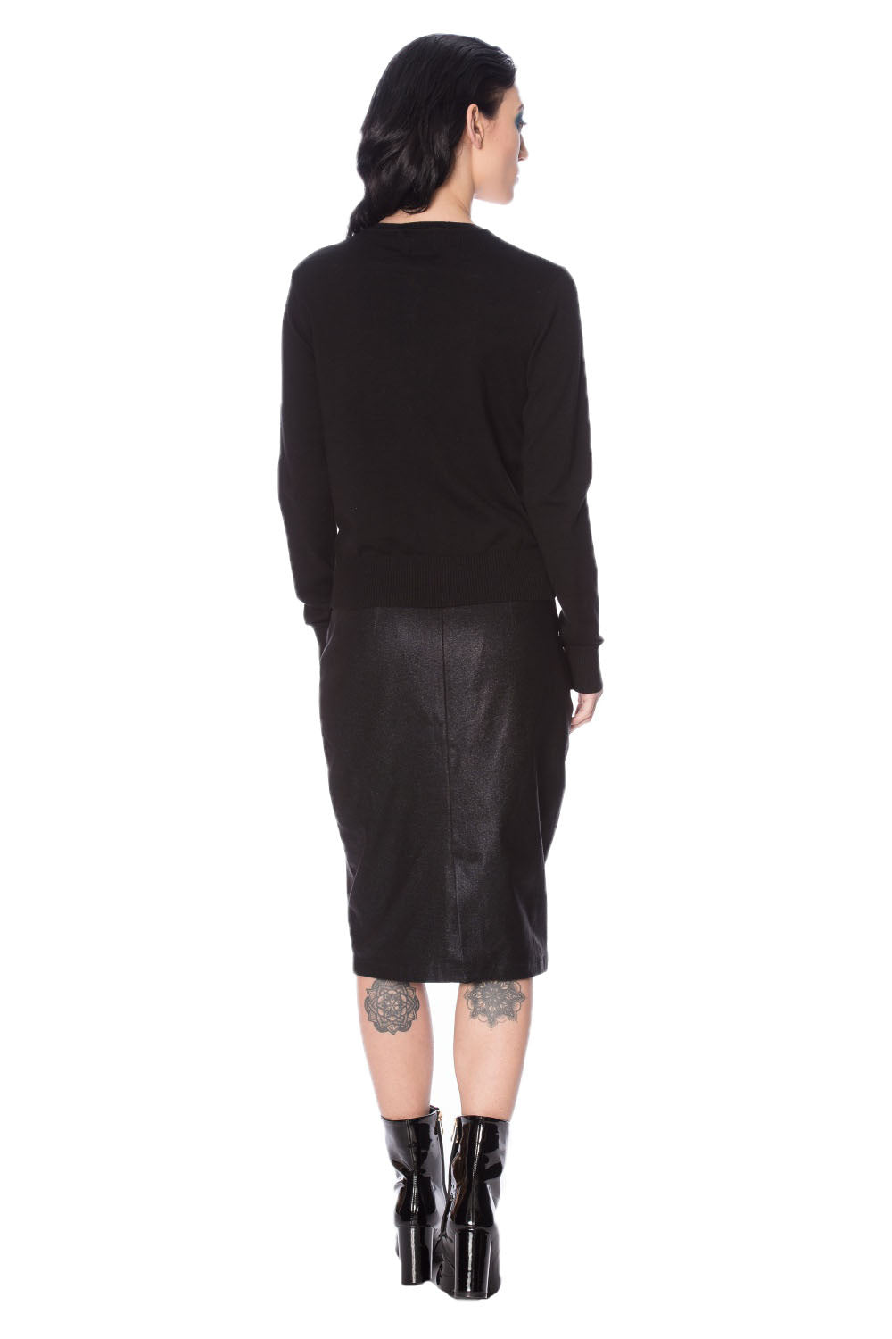 Model showing the plain back of black cardigan