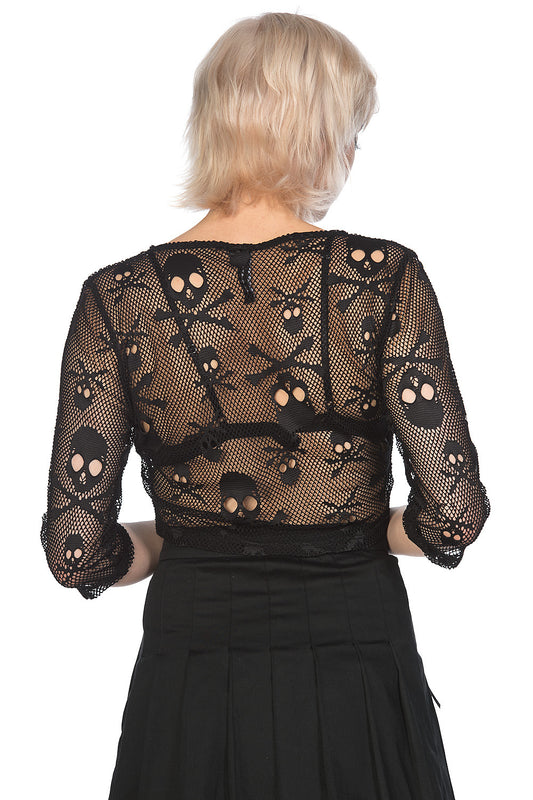 Alternative model in mesh crop top with skulls