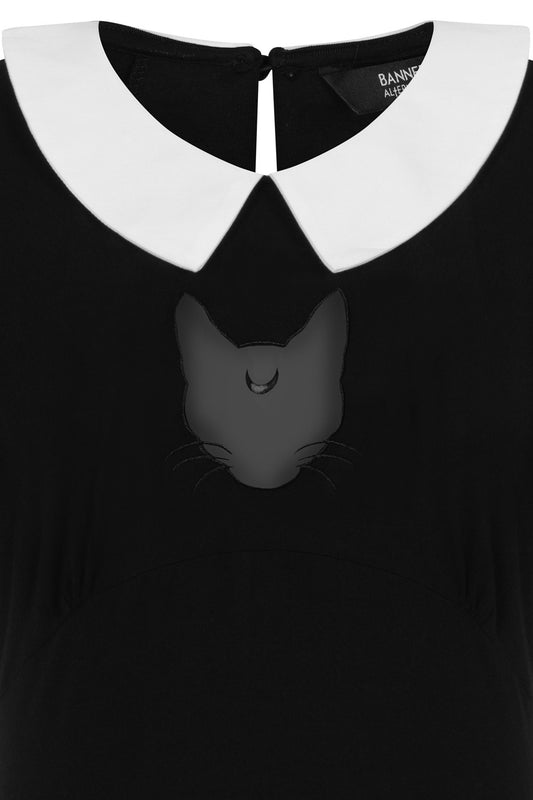 Black top with white collar and cuffs with cat mesh features