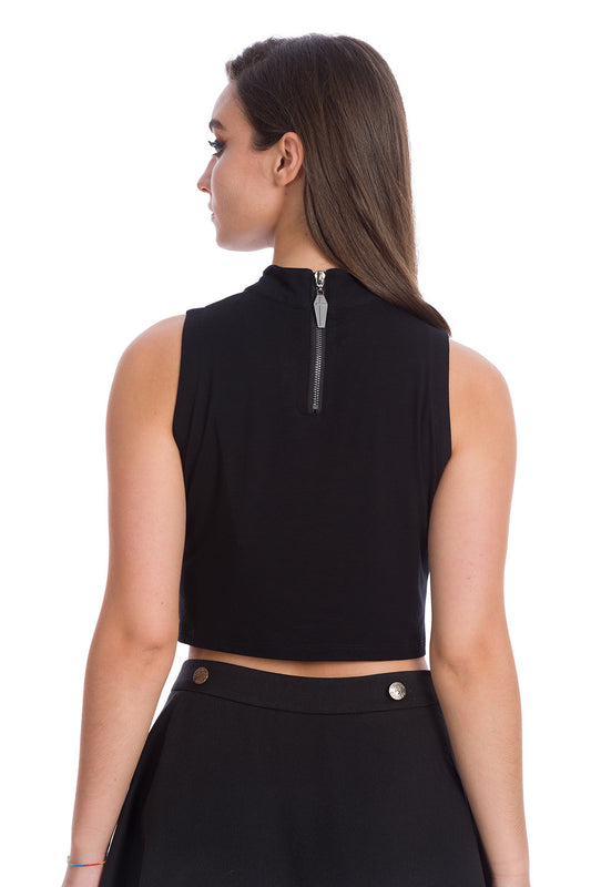 Model showing back of black high next crop top with zip up and coffin pendant