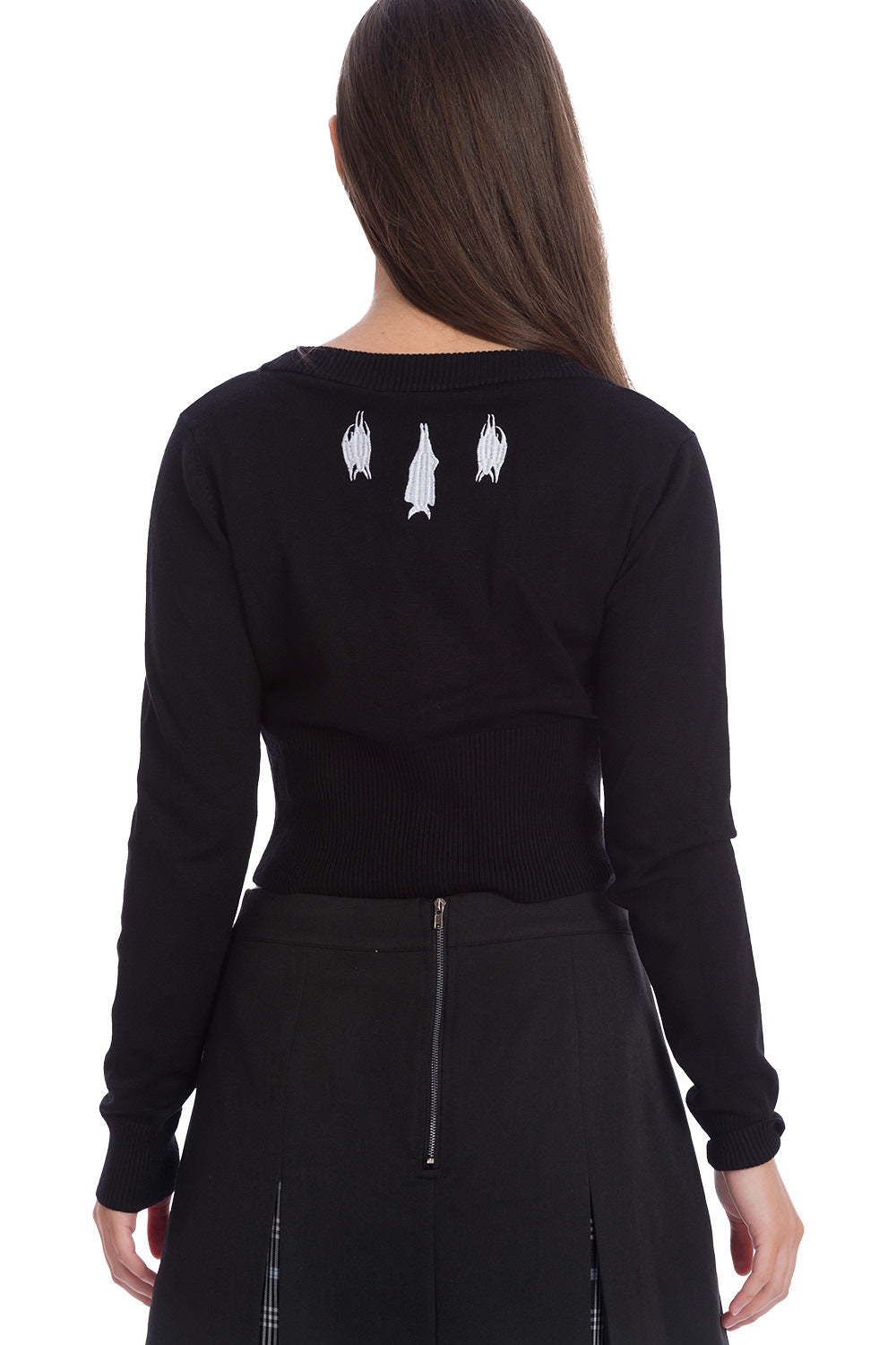 Model showing the back of Black cardigan with white bats
