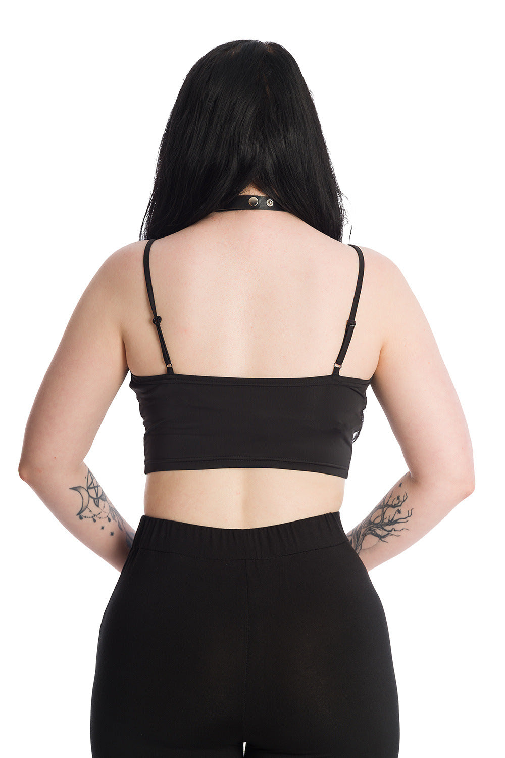 Model showing plain back of black crop top