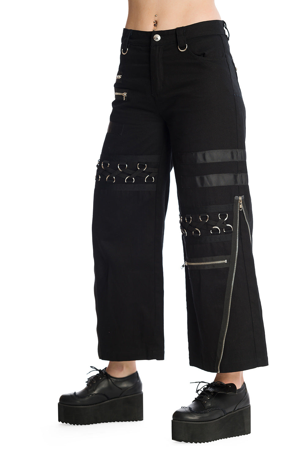 Baggy black trousers with zip and buckle features