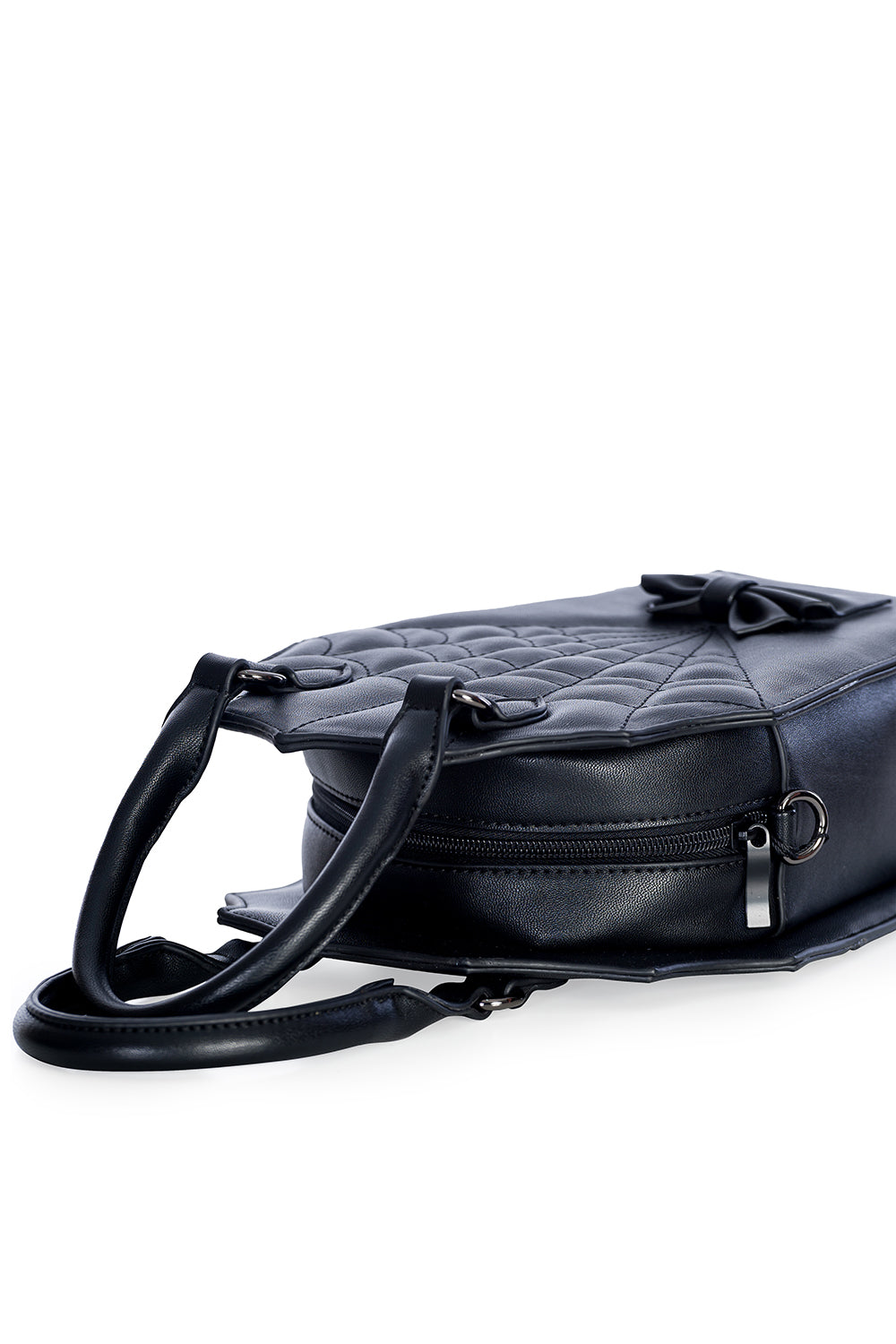 Black quilted coffin shaped handbag with spiderweb and bow