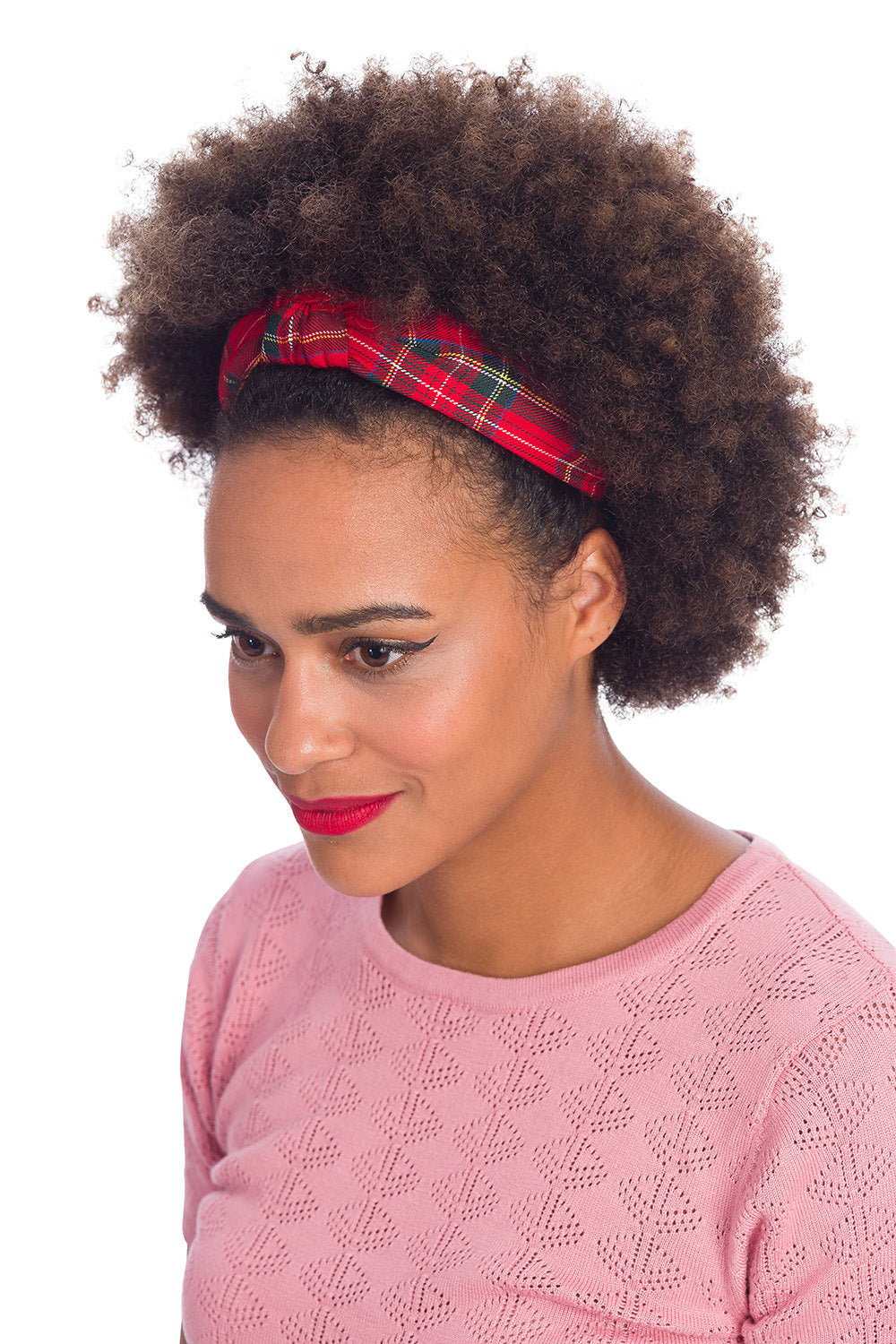 Model wearing red tartan headband