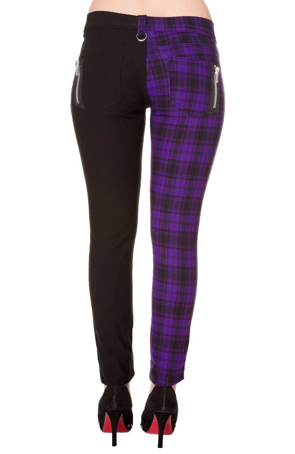 Low rise skinny jeans with one black leg and one purple check leg