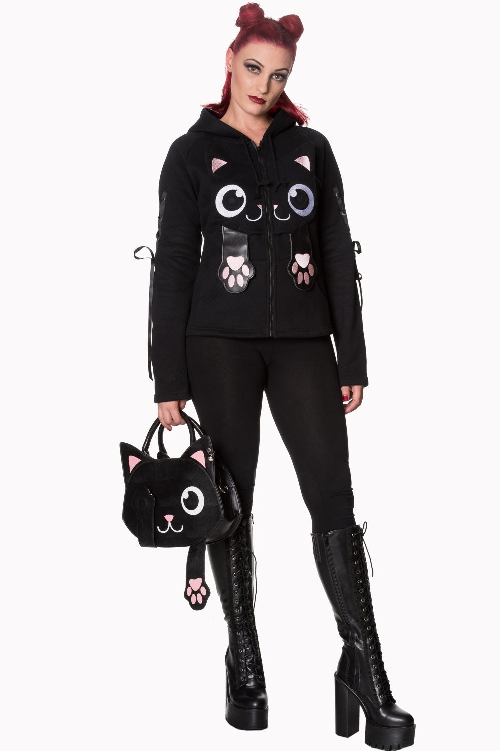 Alternative model holding black cat head shaped handbag with matching hoodie 