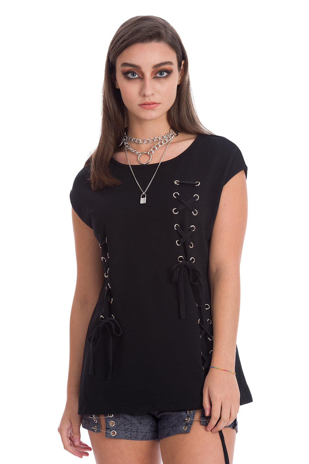 Model wearing long line black t-shirt with corset details in short sleeve