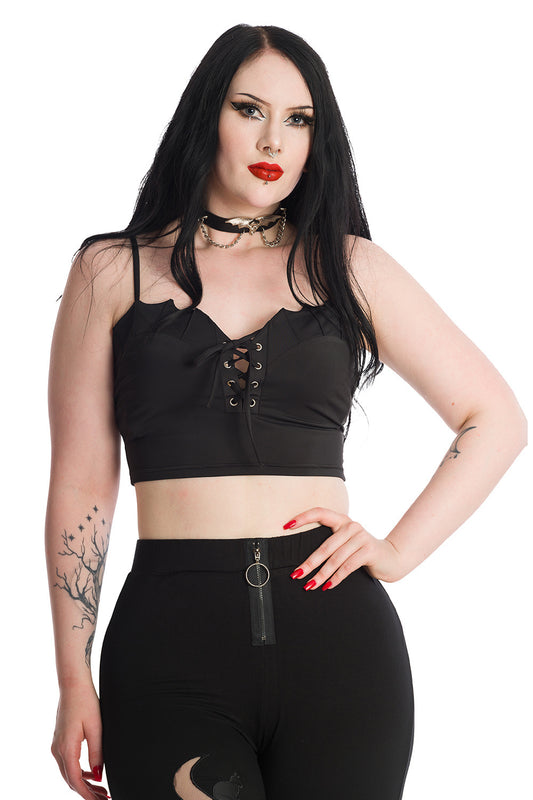 Alternative model wearings a black gothic crop top 