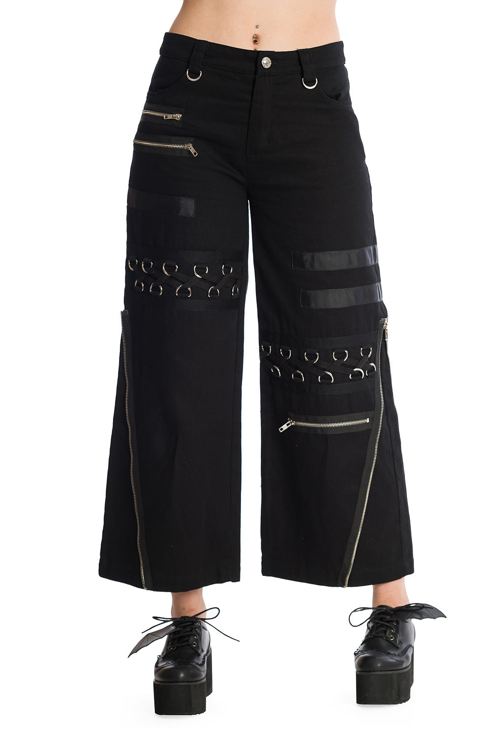 Baggy black trousers with zip and buckle features 