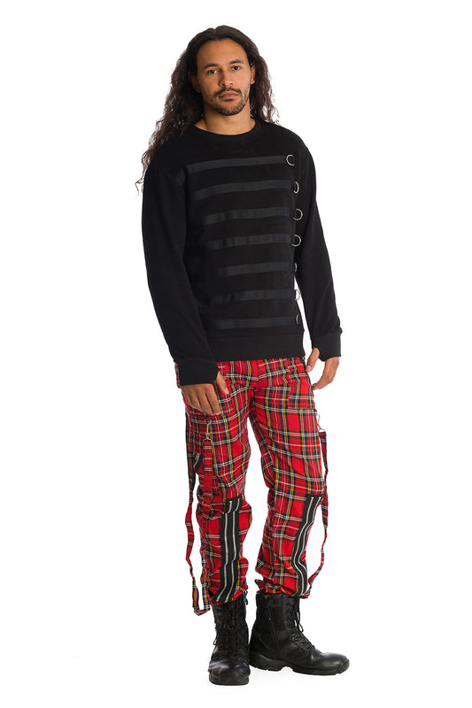 Male model in red tartan trousers with strap details