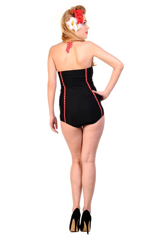 Retro model showing the back on vintage inspired halter neck swimsuit 