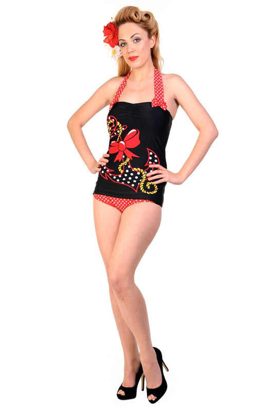 Retro model in vintage inspired black and red swimsuit with anchor motif 