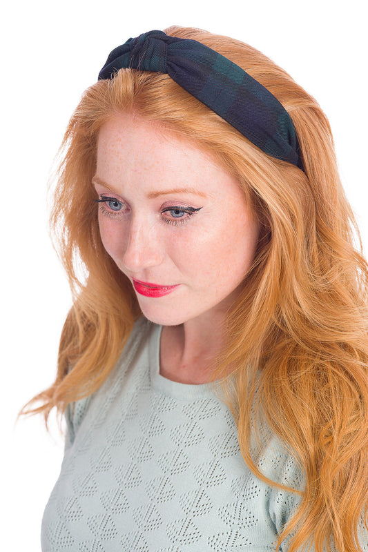 Model wearing green tartan headband