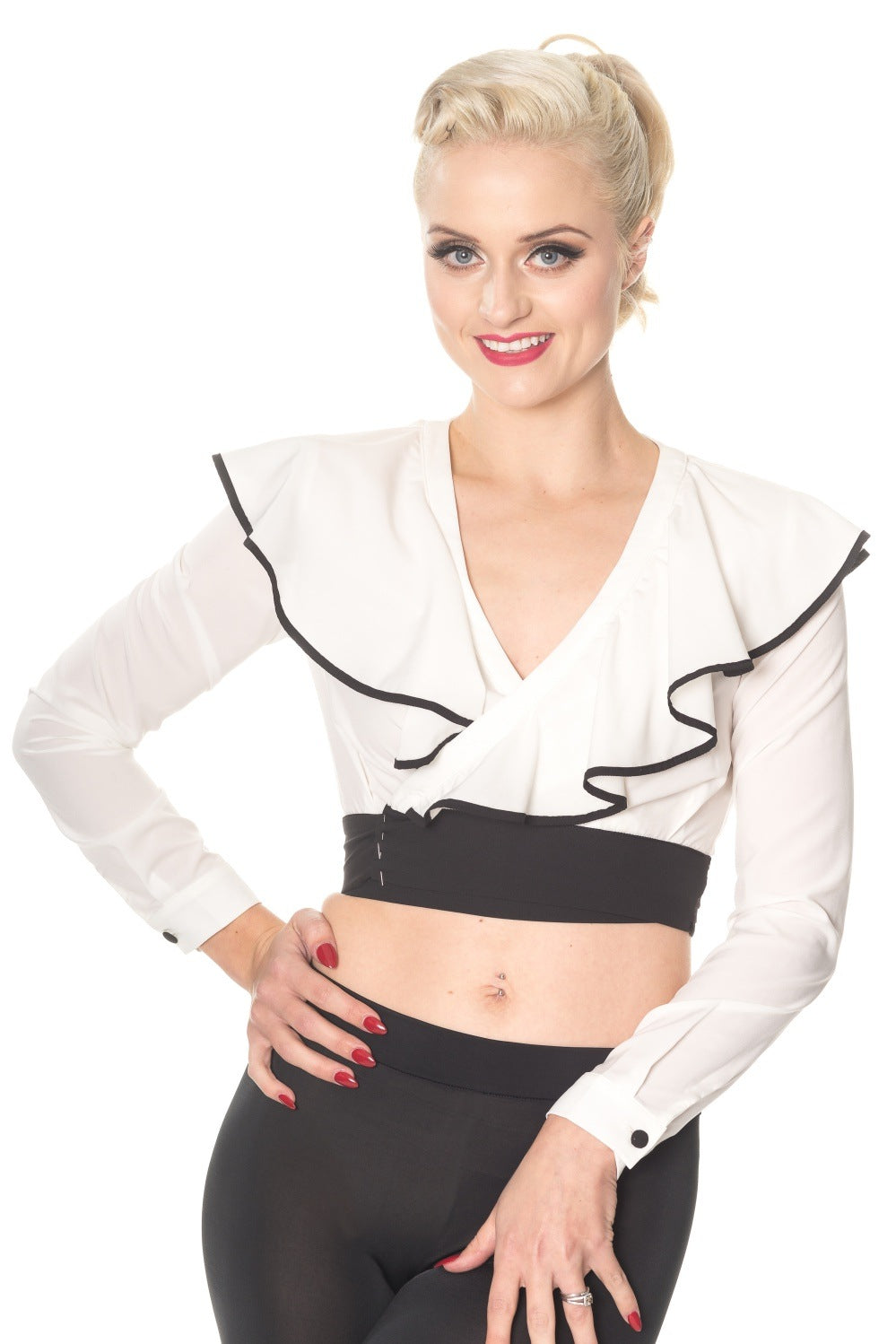 Vintage model wears crop wrap top in white with frills and black trim 