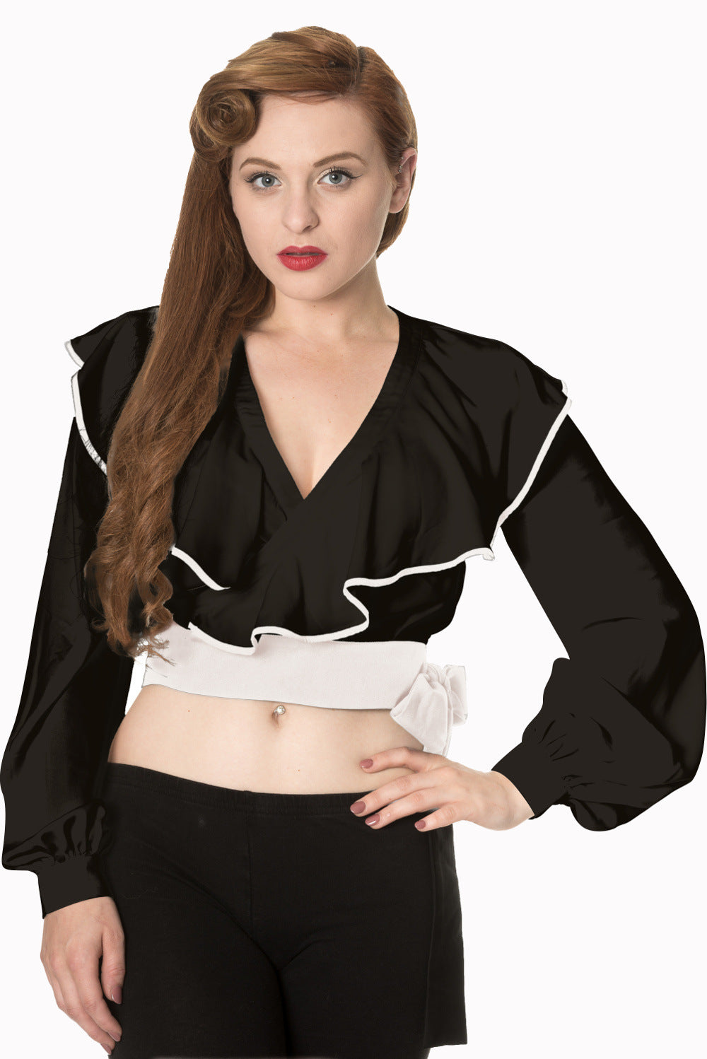 Vintage model wears crop wrap top in black with frills and white trim 