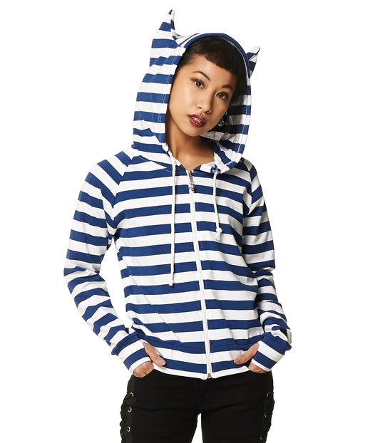 Model wearing a blue and white stripes zip up hoodie with cat ears on the hood and thumb holes in the sleeves